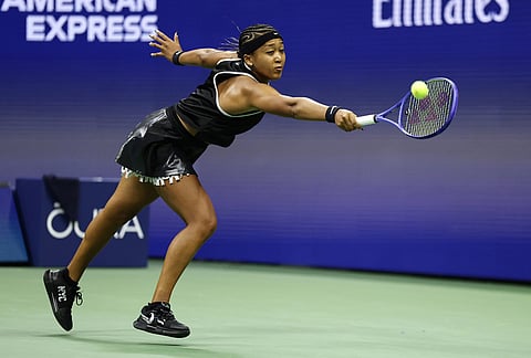 Naomi Osaka, of Japan, returns the ball to Anastasia Zakharova, of Russia, during the first round of the U.S. Open tennis championships Monday, Aug. 31, 2026, in New York. 