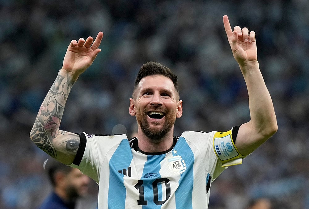 Argentinas Lionel Messi celebrates at the end of the World Cup quarterfinal soccer match against the Netherlands in Lusail, Qatar, Dec. 10, 2022. 