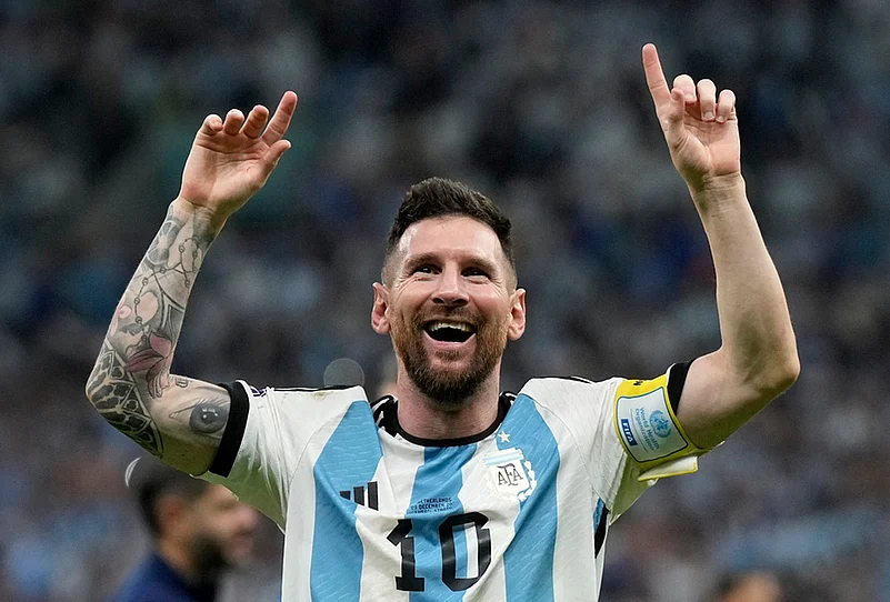 Argentinas Lionel Messi celebrates at the end of the World Cup quarterfinal soccer match against the Netherlands in Lusail, Qatar, Dec. 10, 2022.