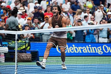 | Photo: AP/Seth Wenig : Carlos Alcaraz, of Spain, celebrates winning a match against Roman Safiullin, of Russia, during the first round of the U.S. Open tennis championships in New York.