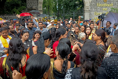 BJP workers stage a demonstration outside the District Collector's office over Congress' opposition to Women's Reservation Bill, in Nashik, Maharashtra.
