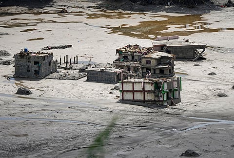 A view of damaged and half-buried buildings under silt and debris following devastating flash floods, in Betrawati, Nuwakot district, Nepal. The flash floods and subsequent mudslides triggered by torrential rainfall caused extensive damage to property and infrastructure across the region. 