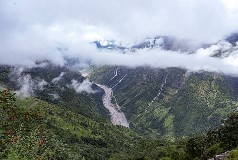 A view of the Bhange waterfall cascading into the Trishuli river, seen after the recent flash floods, at Grang, in Rasuwa district, Nepal.
