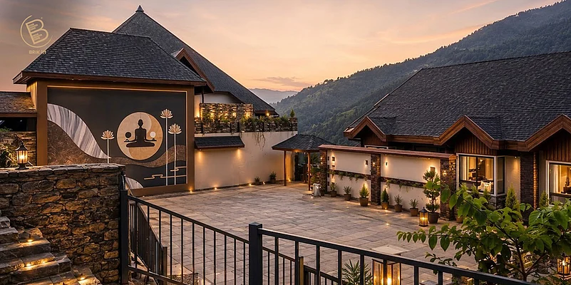 Resort property courtyard in mountains at sunset