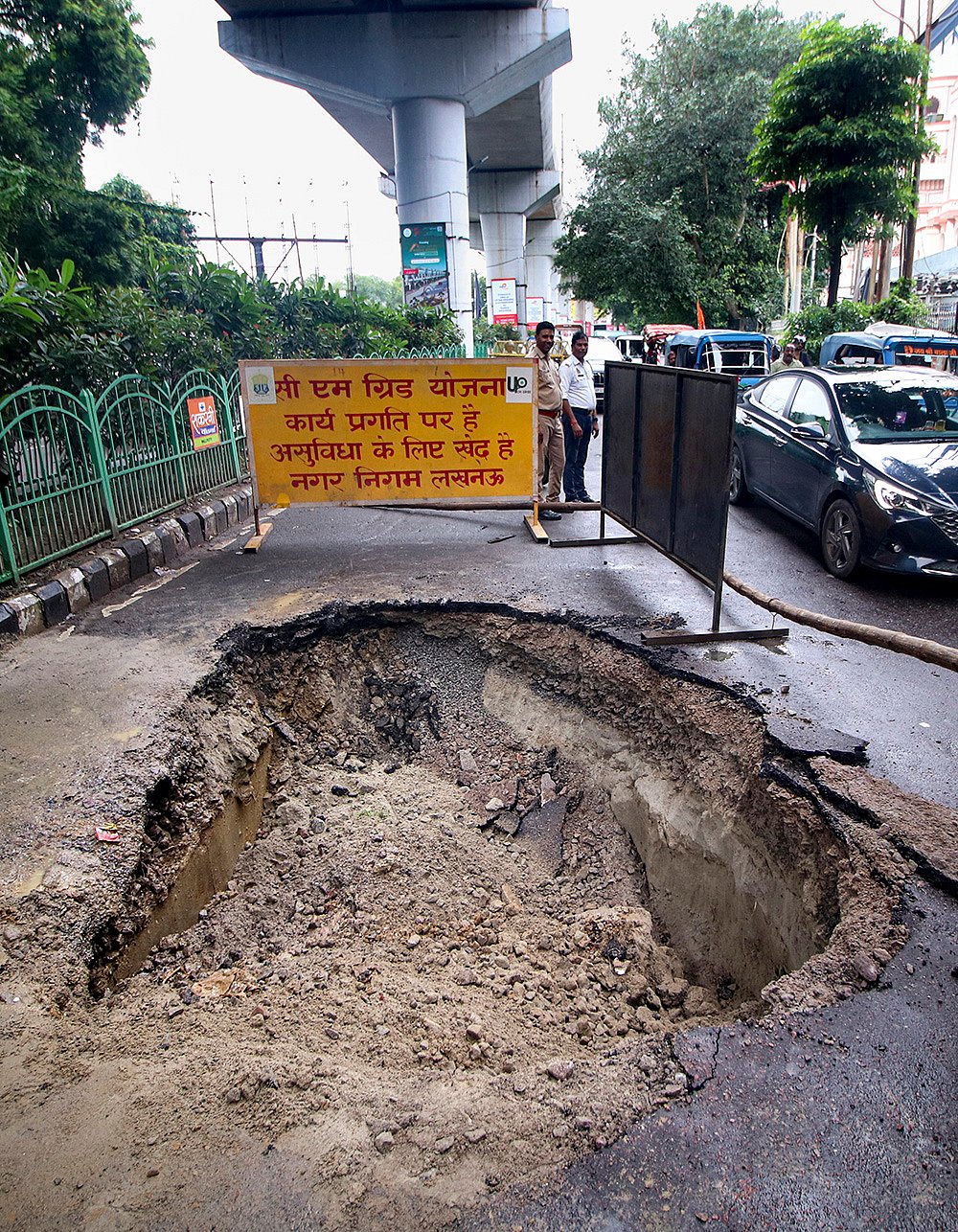 Road caves in outside BJP MP Dinesh Sharmas Lucknow house