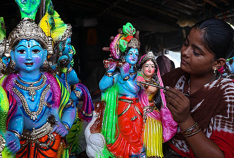 An artisan gives final touches to an idol of lord Krishna ahead of 'Krishna Janmashtami' festival, in Chennai, Saturday, Aug. 29, 2026. 