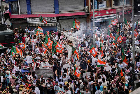Activists of India's ruling Bharatiya Janata Party (BJP) burn an effigy of Jammu and Kashmir Chief Minister Omar Abdullah as they shout slogans during a protest against the National Conference (NC)-led regional government over rising electricity tariffs, unemployment and alleged governance failures in Srinagar, Indian-controlled Kashmir, Wednesday, Sept. 2, 2026. 