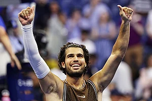 | Photo: AP/Adam Hunger : Carlos Alcaraz, of Spain, celebrates winning a match against Jaime Faria, of Portugal, during the second round of the U.S. Open tennis championships in New York.