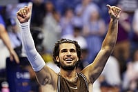 US Open 2026: Carlos Alcaraz Survives Jaime Faria Scare, Roars Back Into Third Round | Photo: AP/Adam Hunger : Carlos Alcaraz, of Spain, celebrates winning a match against Jaime Faria, of Portugal, during the second round of the U.S. Open tennis championships in New York.