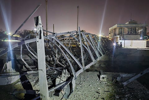 Damage is seen at a communications tower that Iranian media said was hit in a U.S. strike in Kuhestak, southern Iran, early Wednesday, Sept. 2, 2026. 