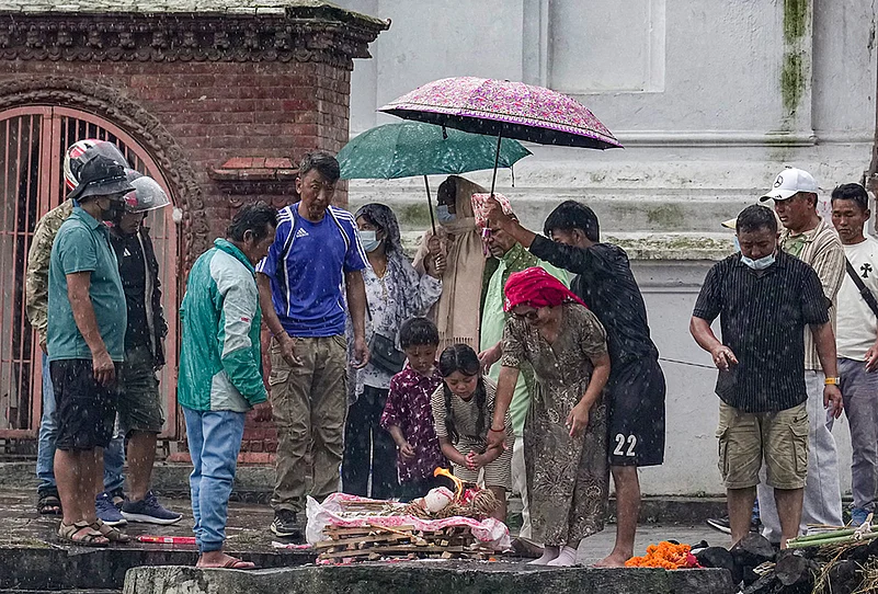 Symbolic funeral for flood victims
