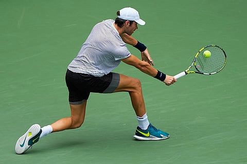 Sebastian Gorzny, of the United States, returns the ball to Daniil Medvedev, of Russia, during the second round of the U.S. Open tennis championships in New York.