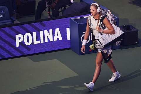 Polina Iatcenko, of Russia, arrives for a match against Aryna Sabalenka, of Belarus, during the second round of the U.S. Open tennis championships in New York.