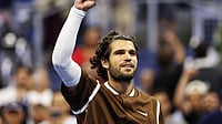 Adam Hunger/AP Photo : Carlos Alcaraz, of Spain, celebrates winning a match against Jaime Faria, of Portugal, during the second round of the U.S. Open tennis championships.