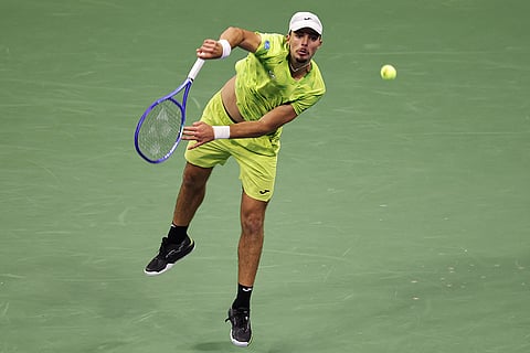 Jaime Faria, of Portugal, serves to Carlos Alcaraz, of Spain, during the second round of the U.S. Open tennis championships in New York.