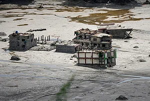 | Photo: PTI/Arun Sharma : A view of damaged and half-buried buildings under silt and debris following devastating flash floods, in Betrawati, Nuwakot district, Nepal, Wednesday, Sept. 2, 2026. The flash floods and subsequent mudslides triggered by torrential rainfall caused extensive damage to property and infrastructure across the region.