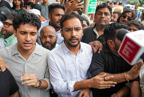 Cockroach Janta Party (CJP) spokespersons Saurav Das and Ashutosh Ranka along with party supporters move towards the Parliament Street police station as they stage a protest, demanding action against self-styled Hindutva influencer Swatantra Bhardwaj over the alleged assault of a student protester's father, in New Delhi. The protest was organised after an interview went viral in which Bhardwaj claimed he assaulted Sanjay Kumar, father of CJP protester Nishu Azad, during a demonstration at Jantar Mantar on July 20th. 