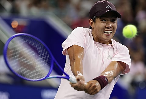 Learner Tien, of the United States, hits a return to Gael Monfils, of France, during the second round of the U.S. Open tennis championships, Thursday, Sept. 3, 2026, in New York.