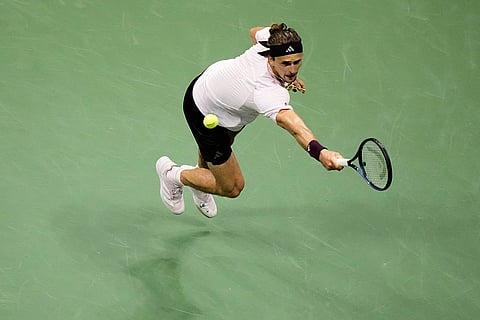 Alexander Zverev, of Germany, hits a return to Quentin Halys, of France, during the second round of the U.S. Open tennis championships in New York.