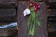 An effigy of a person missing in the deadly flash floods is placed for rituals during a symbolic funeral on the banks of the Bagmati River near Pashupatinath Temple in Kathmandu, Nepal. - | Photo: AP/Niranjan Shrestha