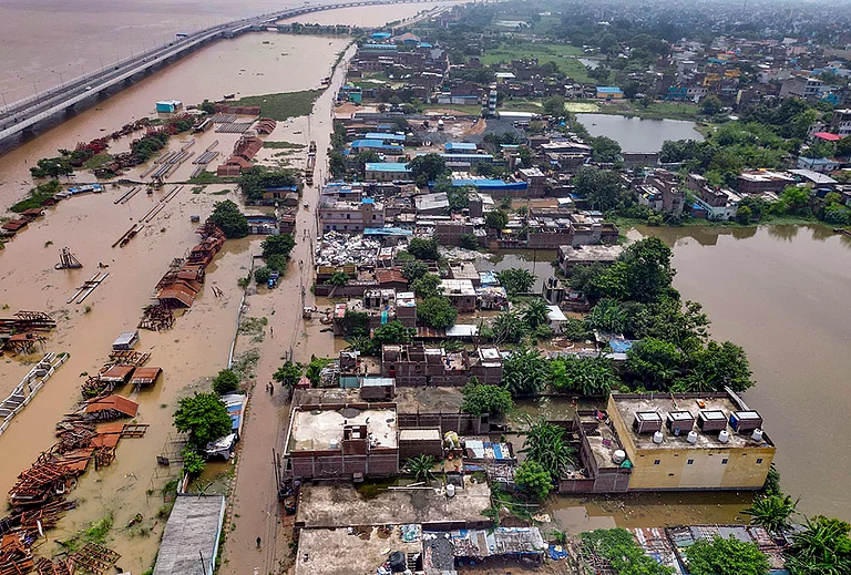An aerial view of a residential area inundated by floodwaters following the rise in the water level of the Ganga river, in Patna, Bihar, Friday, Sept. 4, 2026. - | Photo: PTI