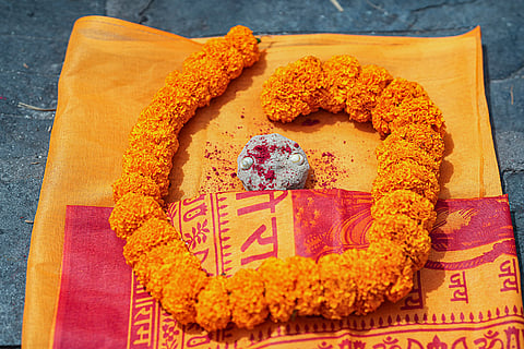 A representational effigy placed during a symbolic funeral of flood victims still reported missing, in accordance with Nepali Hindu rites, at Pashupatinath temple in Kathmandu, Nepal.
