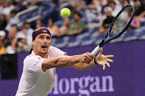 Alexander Zverev, of Germany, hits a return to Quentin Halys, of France, during the second round of the U.S. Open tennis championships in New York.