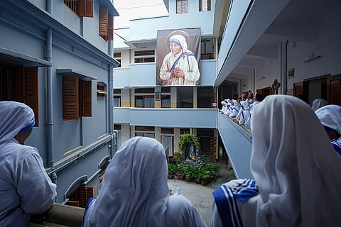 Nuns gather to offer prayers on the death anniversary of Mother Teresa, at the Missionaries of Charity, in Kolkata, West Bengal.
