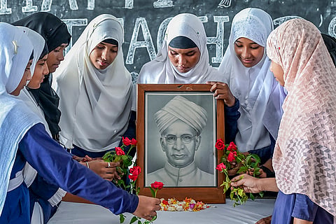 Nadia: Students pay floral tribute to former President Dr S. Radhakrishnan on Teacher's Day, in Nadia, West Bengal.