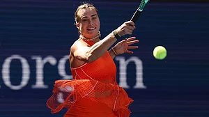 Heather Khalifa/AP Photo : Aryna Sabalenka, of Belarus, returns the ball to Kamilla Rakhimova, of Uzbekistan, during the third round of the U.S. Open tennis championships.