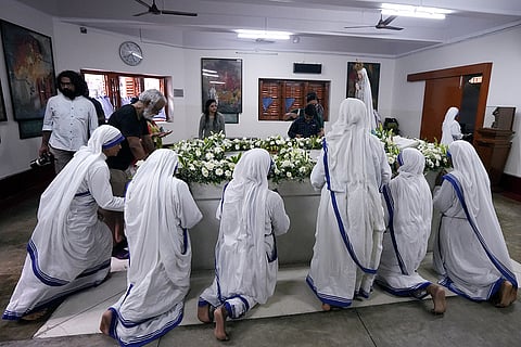 Nuns offer prayers to observe on the death anniversary of Mother Teresa, at the Missionaries of Charity, in Kolkata, West Bengal.