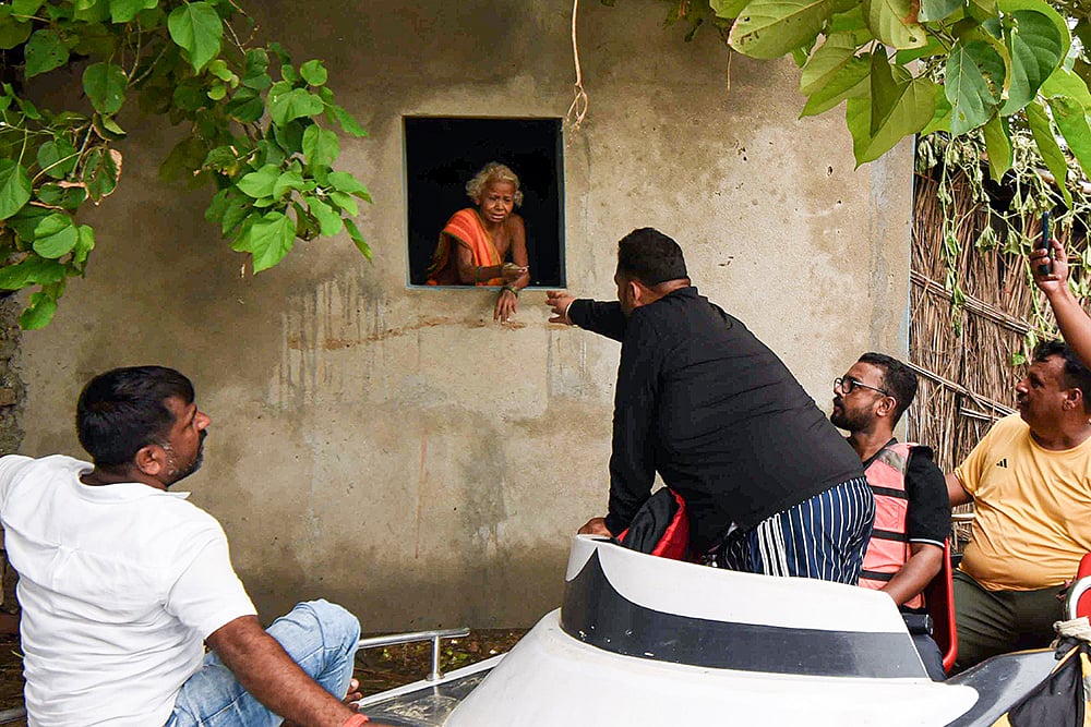 Rajesh Ranjan distributes relief aid to flood-affected people