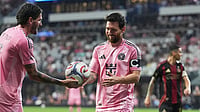 Lionel Messi Bags Two Assists on Club Return As Inter Miami Draw 2-2 With Atlanta United | Photo: AP/Lynne Sladky : Inter Miami midfielder Rodrigo De Paul, left hands the ball to forward Lionel Messi for a corner kick during the second half of an MLS soccer match against Atlanta United, Saturday, Sept. 5, 2026, in Miami.