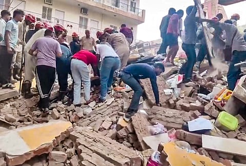 Rescue operation underway after a building collapsed at Satya Niketan area, in New Delhi, Sunday, Sept. 6, 2026. 