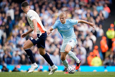 Manchester City's Erling Haaland, right, in action during the English Premier League soccer match between Manchester City and Coventry City in Manchester, England, Saturday, Sept. 5, 2026. 