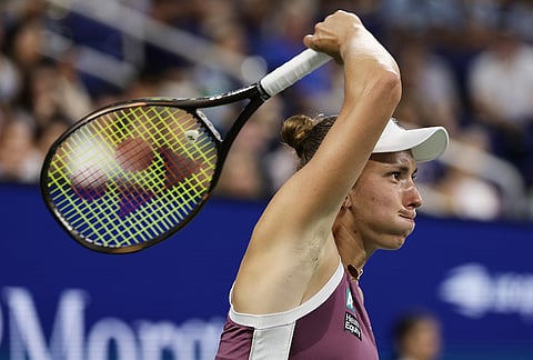 Elise Mertens, of Belgium, hits a return to Naomi Osaka, of Japan, during the third round of the U.S. Open tennis championships, Saturday, Sept. 5, 2026, in New York. 