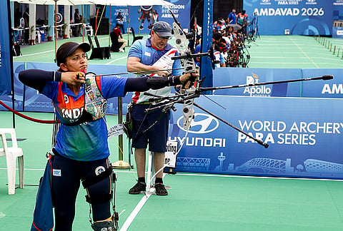 India's para-archer Sheetal Devi, left, and others compete during the World Archery Para Series, in Ahmedabad.