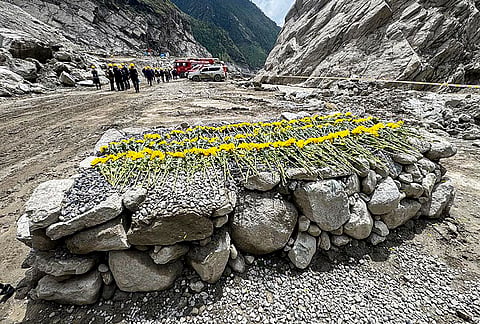 Rescue workers at the site of the immigration building which was wiped by Aug 26 flash flood, Gyrong county at Tibet Nepal border. 