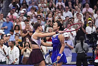 | Photo: AP/Frank Franklin II : Iva Jovic, left, of the United States, embraces Alexandra Eala, of the Philippines, after Jovic won in three sets in the third round of the U.S. Open tennis championships, Saturday, Sept. 5, 2026, in New York. 