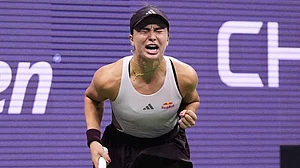 AP Photo/Frank Franklin II : Iva Jovic, of the United States, celebrates after defeating Alexandra Eala, of the Philippines, in three sets in the third round of the U.S. Open tennis championships.