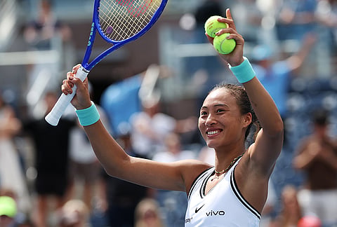 Zheng Qinwen, of China, gestures after she won her match against Madison Keys, of the United States, during the third round of the U.S. Open tennis championships Saturday, Sept. 5, 2026, in New York. 