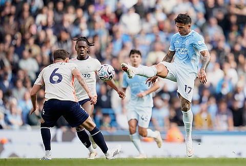 Manchester City's Enzo Fernandez, right, and Coventry City's Matt Grimes, left, in action during the English Premier League soccer match between Manchester City and Coventry City in Manchester, England, Saturday, Sept. 5, 2026. 