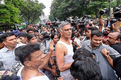 MLA T Harish Rao and other party leaders during a protest against the Congress government outside the Telangana Legislative Assembly on the opening day of the monsoon session, in Hyderabad.