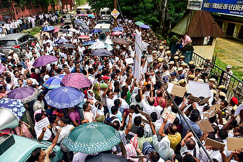 Assam Primary Teachers Association members stage a protest in front of the Directorate of Elementary Education office regarding their various demands, in Guwahati.
