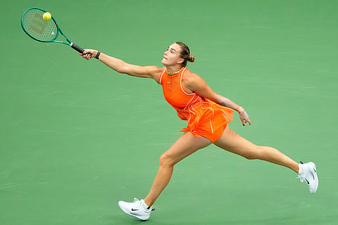 Aryna Sabalenka, of Belarus, returns the ball to Taylor Townsend, of the United States, during the fourth round of the U.S. Open tennis championships in New York.