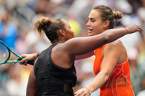Aryna Sabalenka, of Belarus, greets Taylor Townsend, of the United States, left, after Sabalenka won their match during the fourth round of the U.S. Open tennis championships in New York.