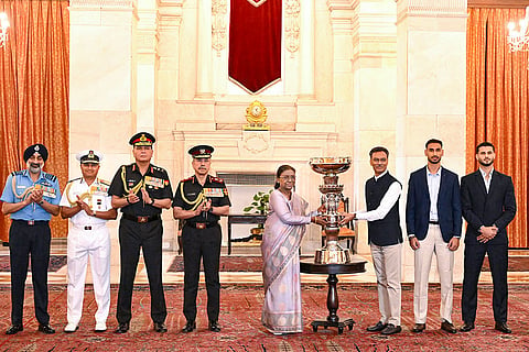 In this image posted on Sept. 7, 2026, President Droupadi Murmu hands over the President’s Cup of the Durand Cup Tournament 2026 to the winning team, East Bengal Football Club, at Rashtrapati Bhavan, in New Delhi. Among those present on the occasion are Chief of Defence Staff General N.S. Raja Subramani, Chief of Army Staff General Dhiraj Seth, Chief of Air Staff Air Chief Marshal A P Singh and Chief of Naval Staff Admiral Krishna Swaminathan, along with officials and players of East Bengal Football Club.