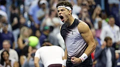 Frances Tiafoe defeated 2021 champion Daniil Medvedev in straight sets to secure his spot in the US Open quarterfinals. - Adam Hunger/AP Photo