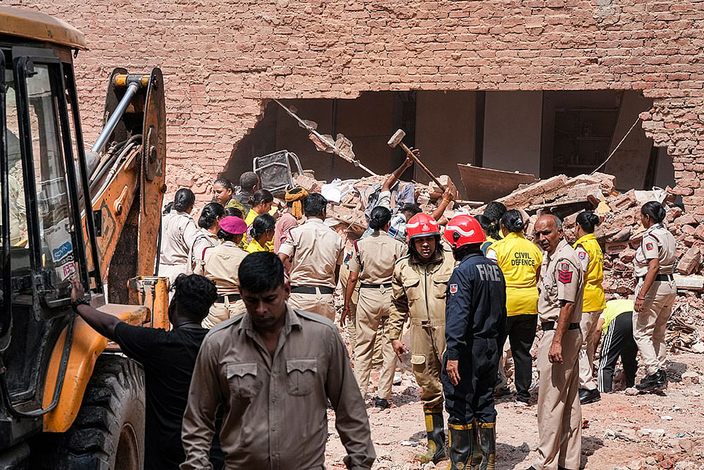 Building collapses in south Delhis Satya Niketan