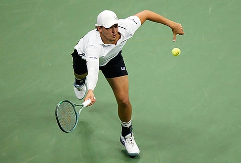 Luciano Darderi, of Italy, returns the ball to Alexander Zverev, of Germany, during the fourth round of the U.S. Open tennis championships Monday, Sept. 7, 2026, in New York. 